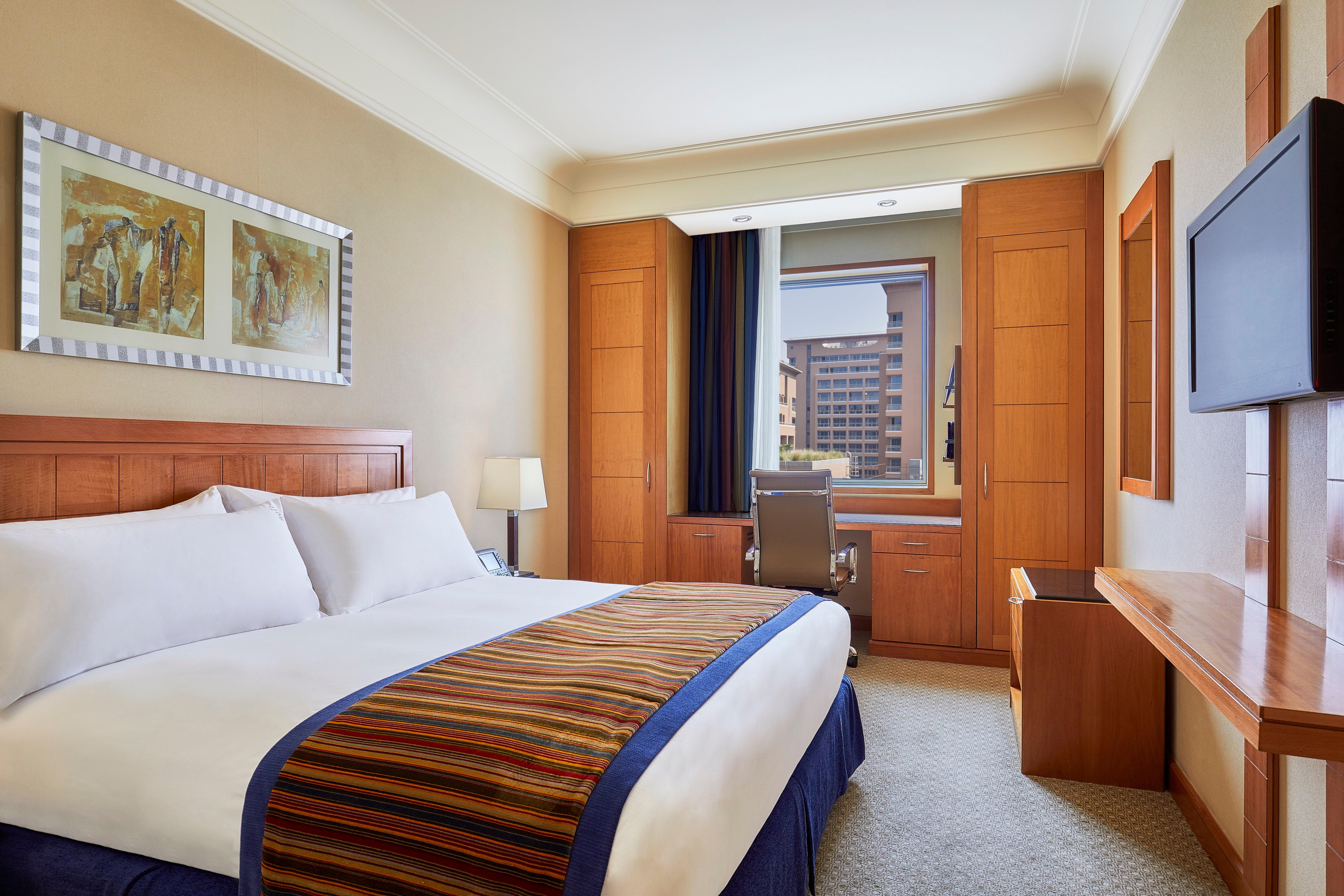 Holiday Inn Citystars By Ihg El El Cairo Exterior foto A bedroom at the hotel